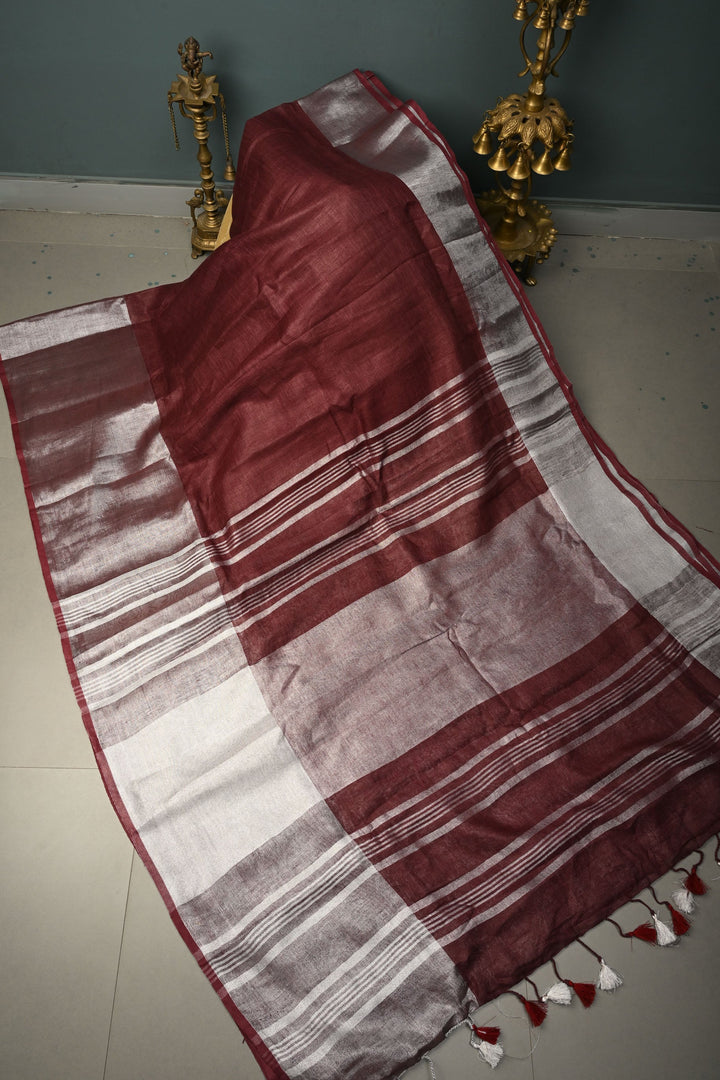 Maroon Linen Saree with Silver Zari Border | SHOBITAM