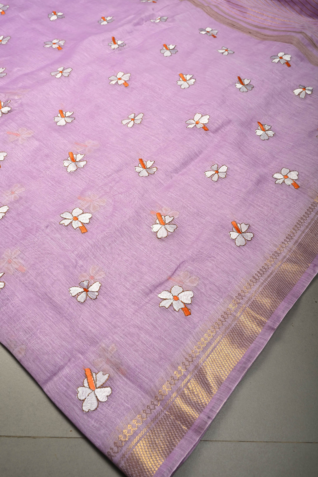 Lavender Tone silk linen saree with white Parijaat Floral embroidery and Zari Border | SHOBITAM