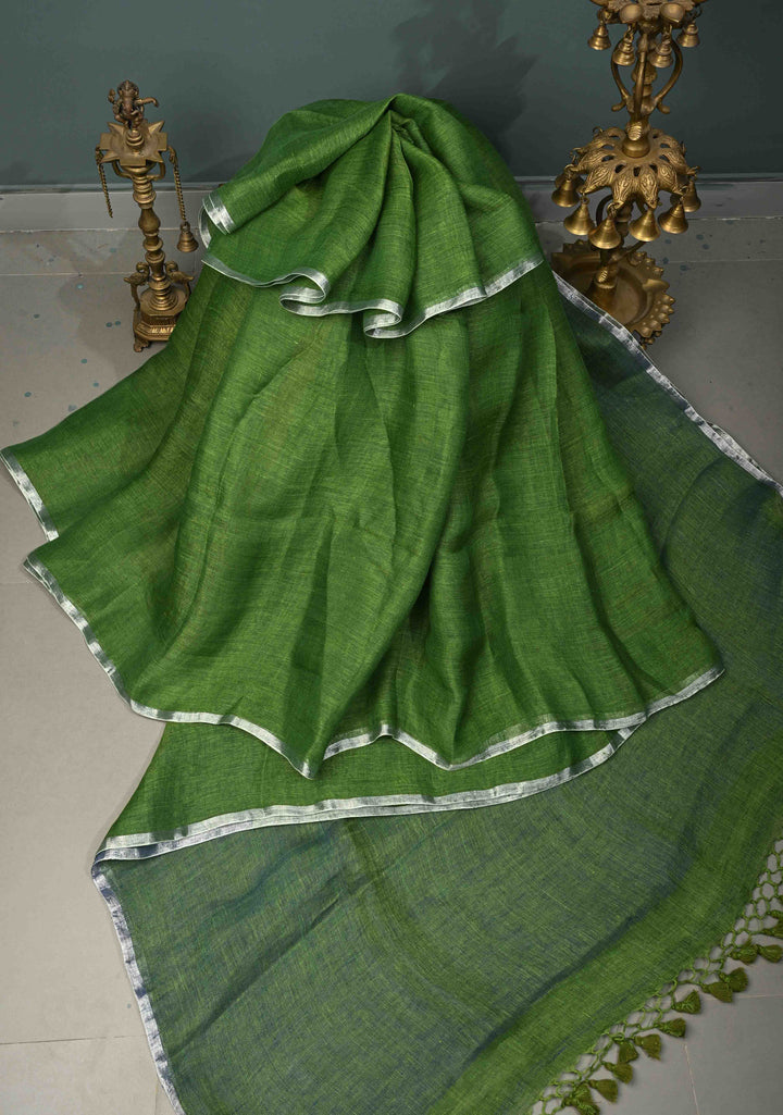 Grass Green Handloom Linen by Linen Saree with Minimal Tissue Border and Honeycomb Tassels | SHOBITAM