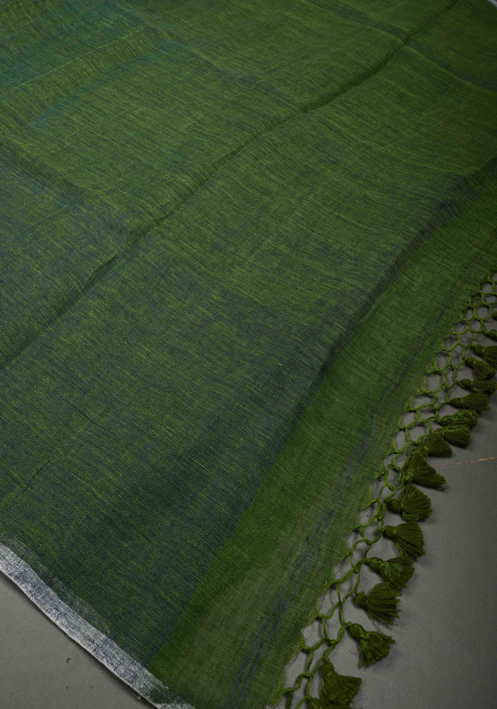Grass Green Handloom Linen by Linen Saree with Minimal Tissue Border and Honeycomb Tassels | SHOBITAM