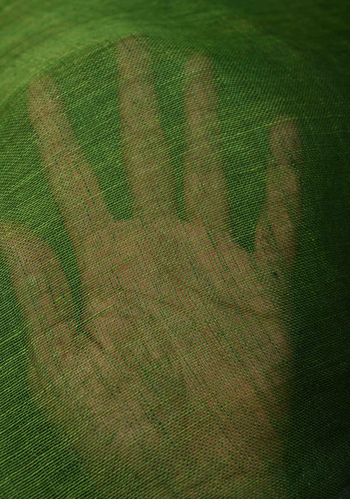 Grass Green Handloom Linen by Linen Saree with Minimal Tissue Border and Honeycomb Tassels | SHOBITAM