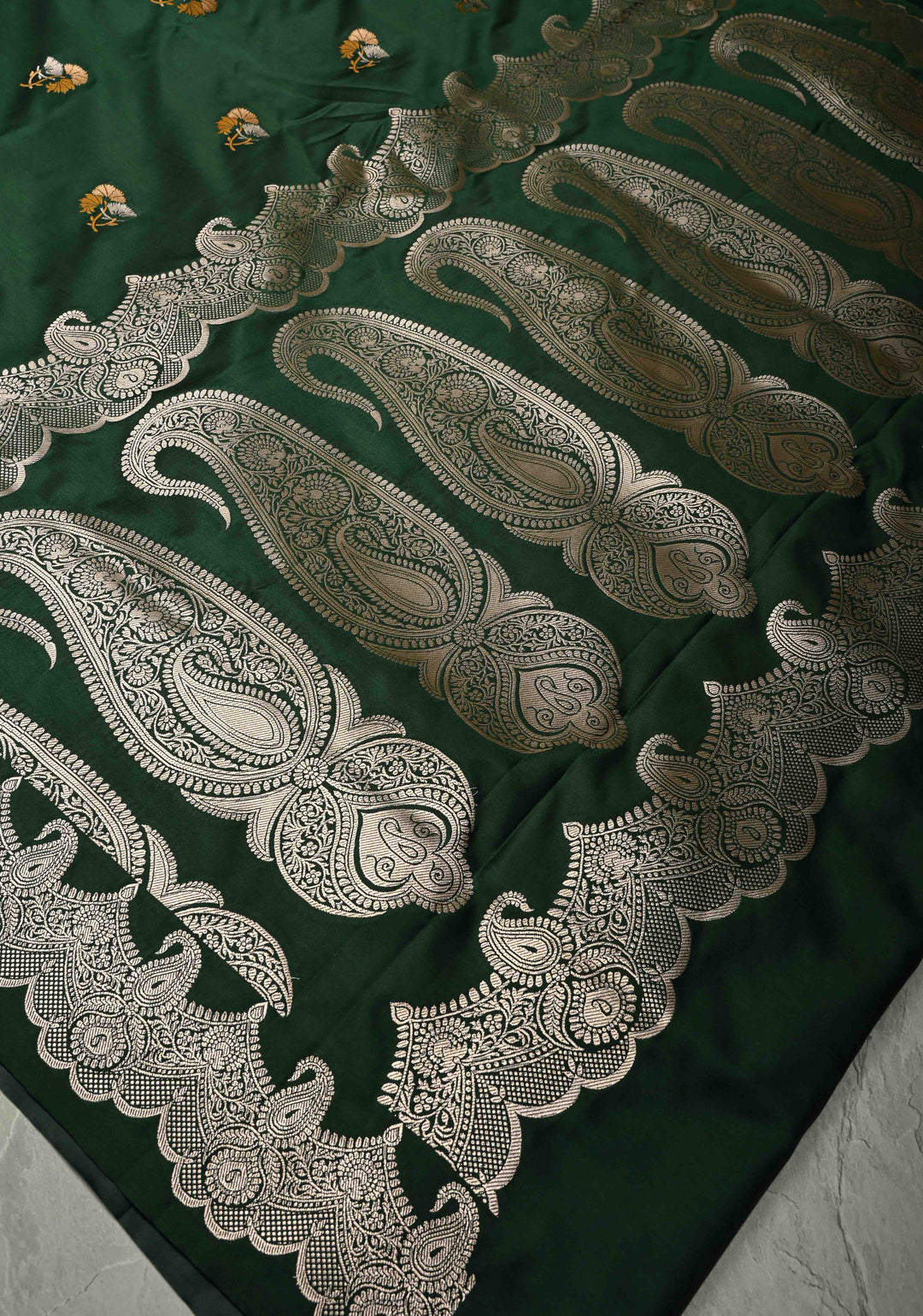 Bottle Green Banarasi Semi Mashru Silk Saree with Meenakari Floral Buttas and Silver Scallop Border