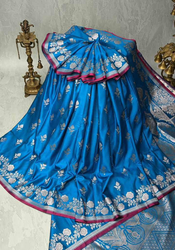 Sapphire Blue Banarasi Semi Mashru Silk Saree with Floral Silver Buttas and Zari Border