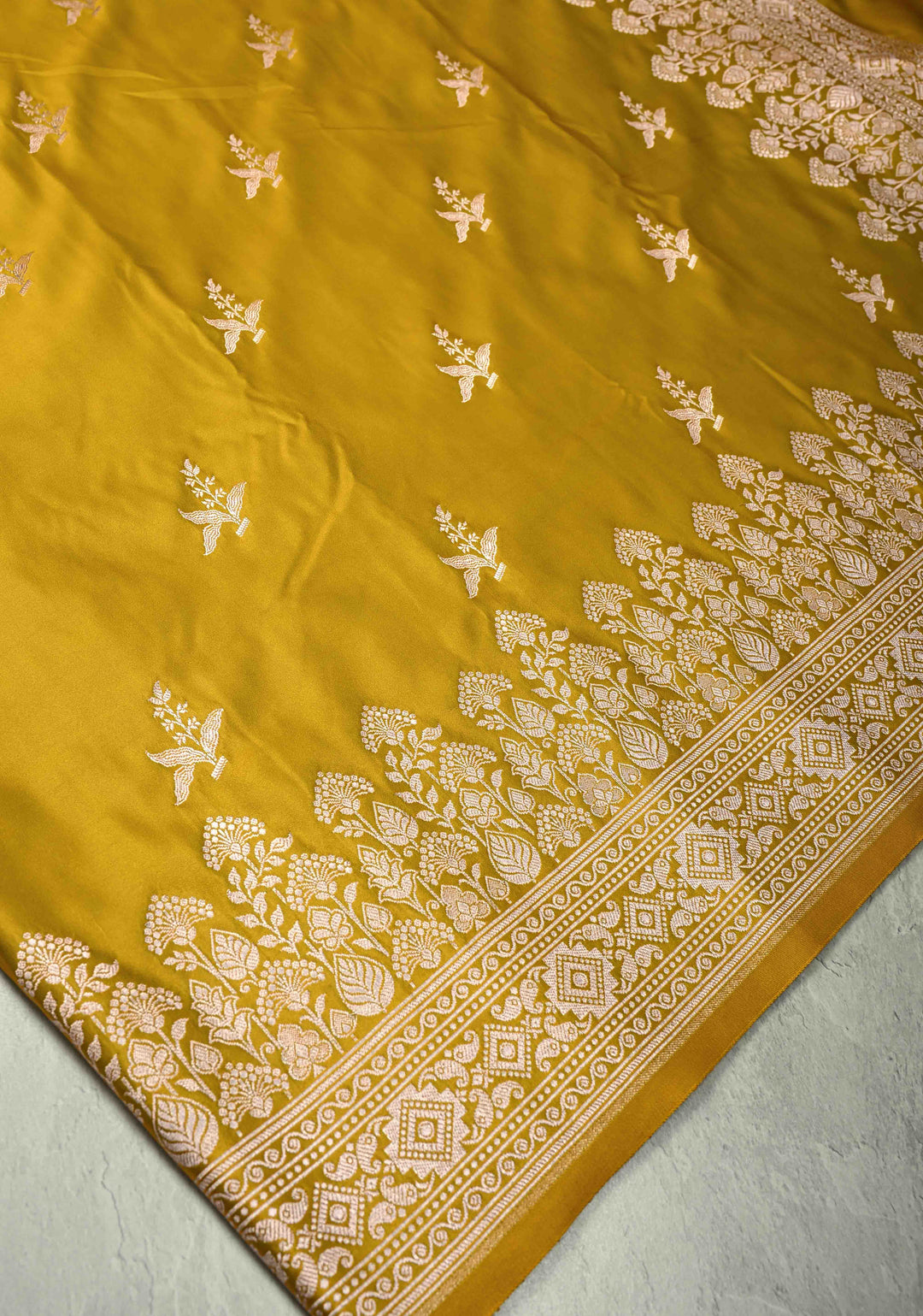 Musturd Yellow Banarasi Semi Mashru Silk Saree with Floral Silver Zari Buttas and Zari Border