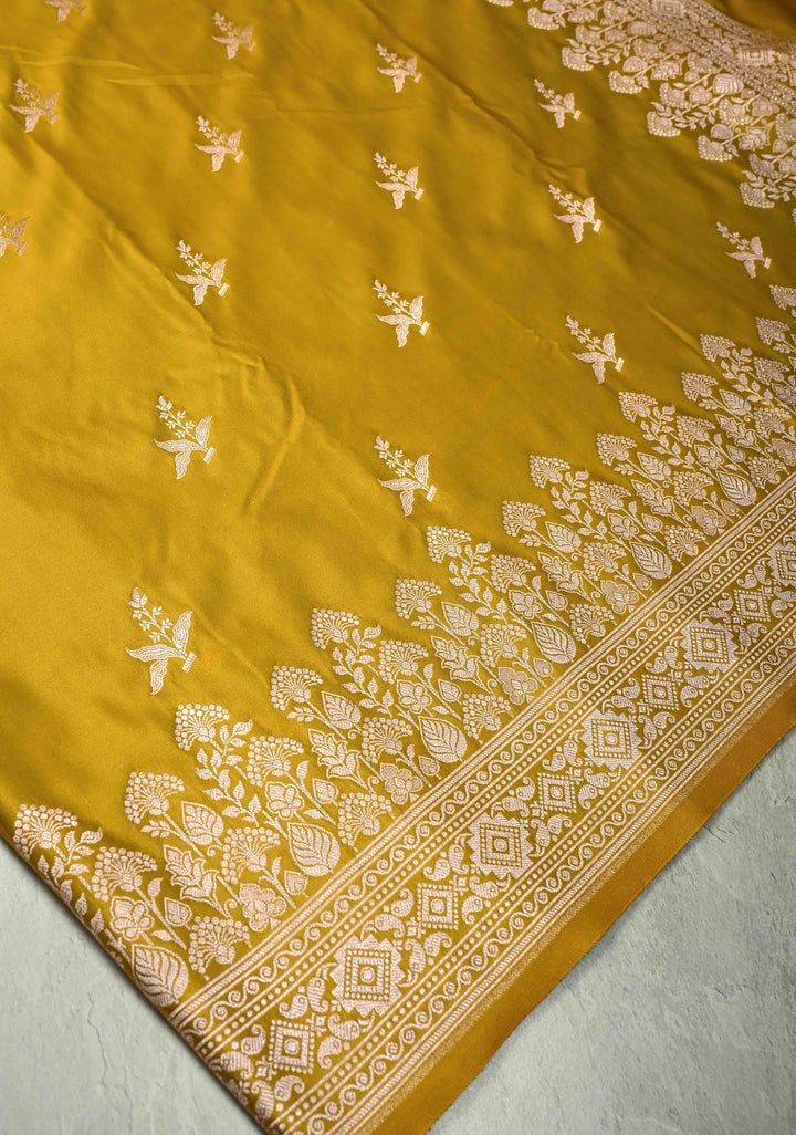 Musturd Yellow Banarasi Semi Mashru Silk Saree with Floral Silver Zari Buttas and Zari Border