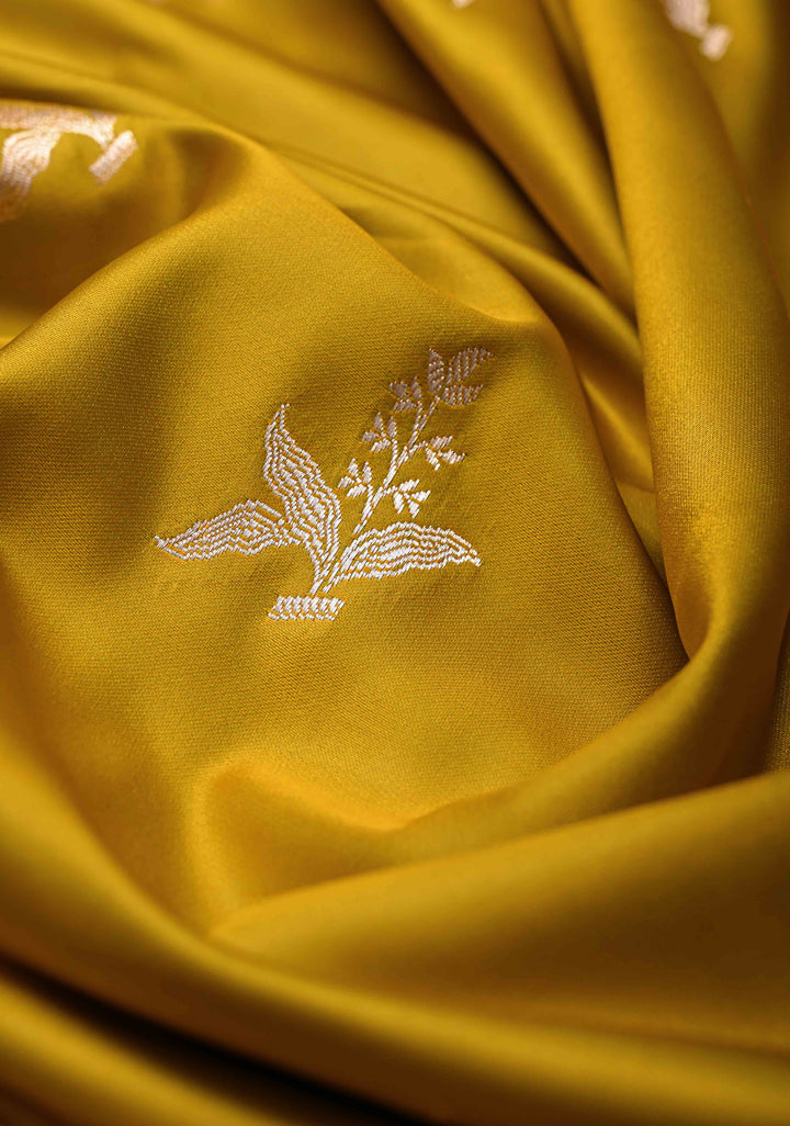 Musturd Yellow Banarasi Semi Mashru Silk Saree with Floral Silver Zari Buttas and Zari Border