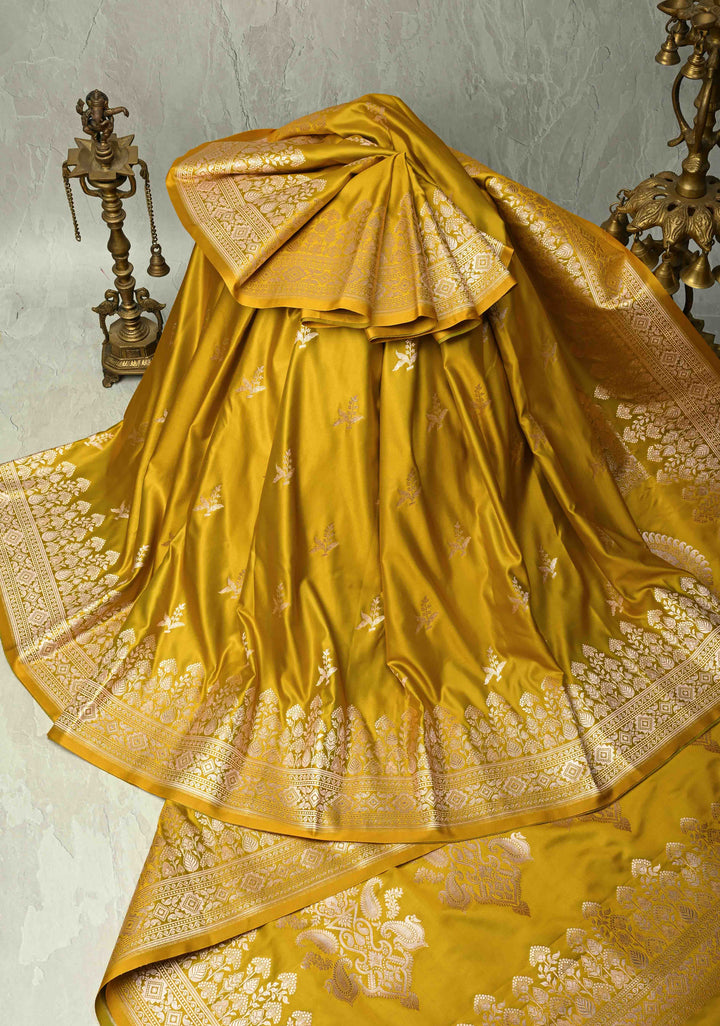 Musturd Yellow Banarasi Semi Mashru Silk Saree with Floral Silver Zari Buttas and Zari Border