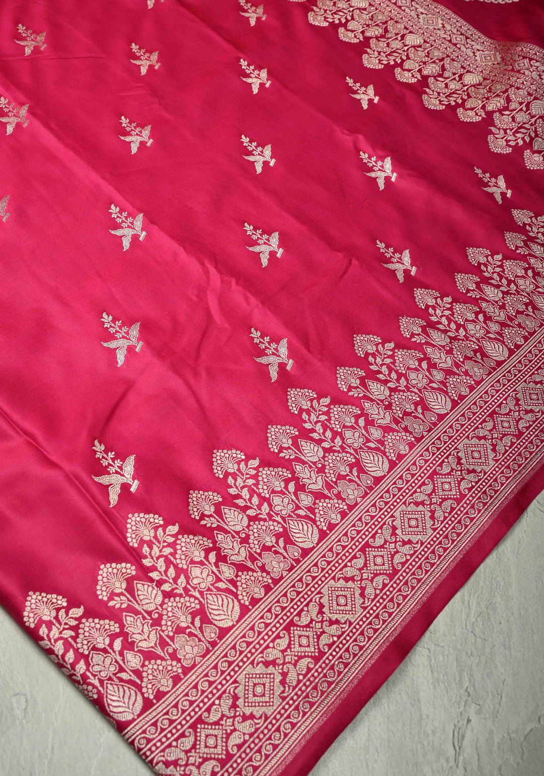 Rani Pink Banarasi Semi Mashru Silk Saree with Floral Silver Zari Buttas and Zari Border