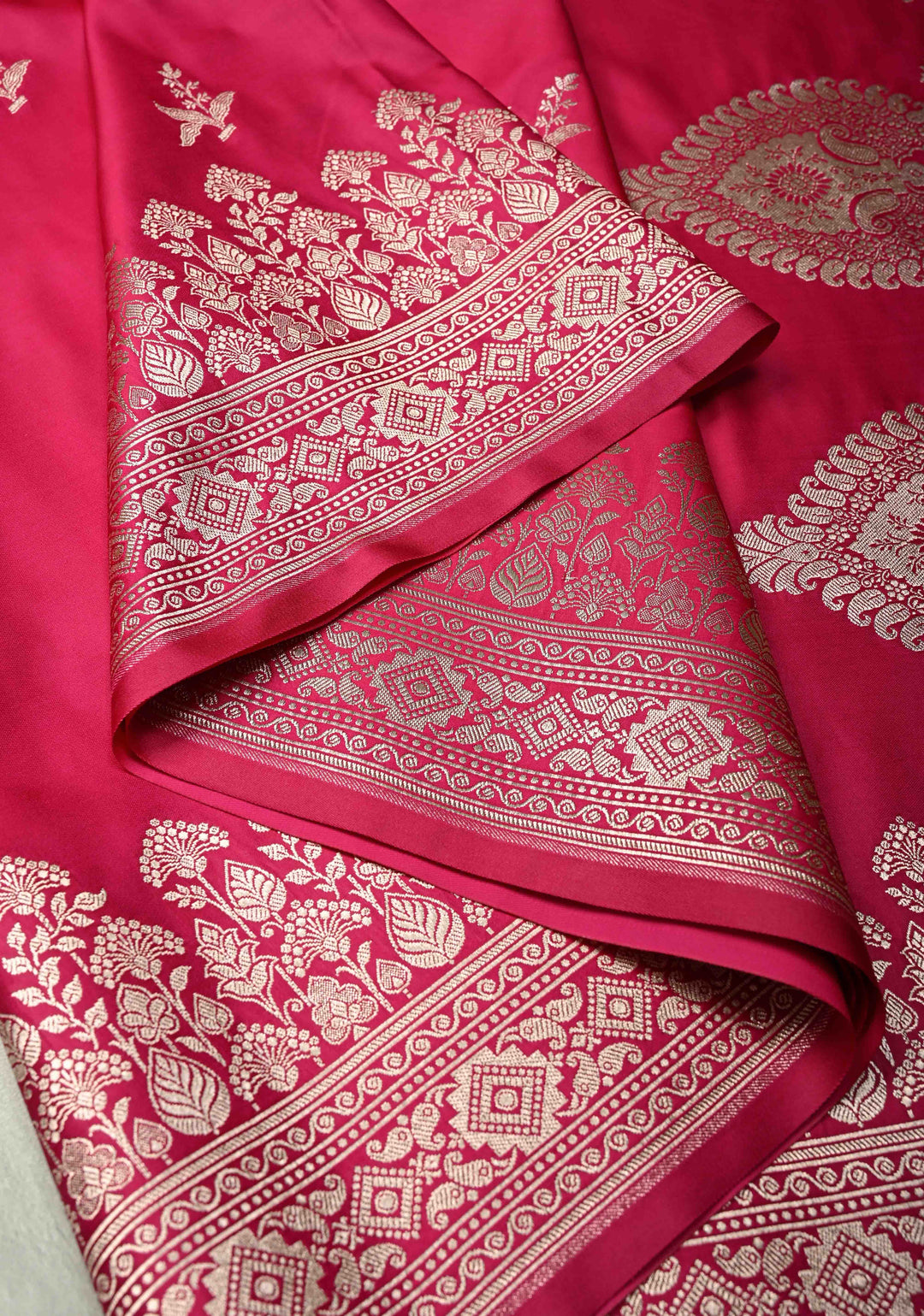 Rani Pink Banarasi Semi Mashru Silk Saree with Floral Silver Zari Buttas and Zari Border