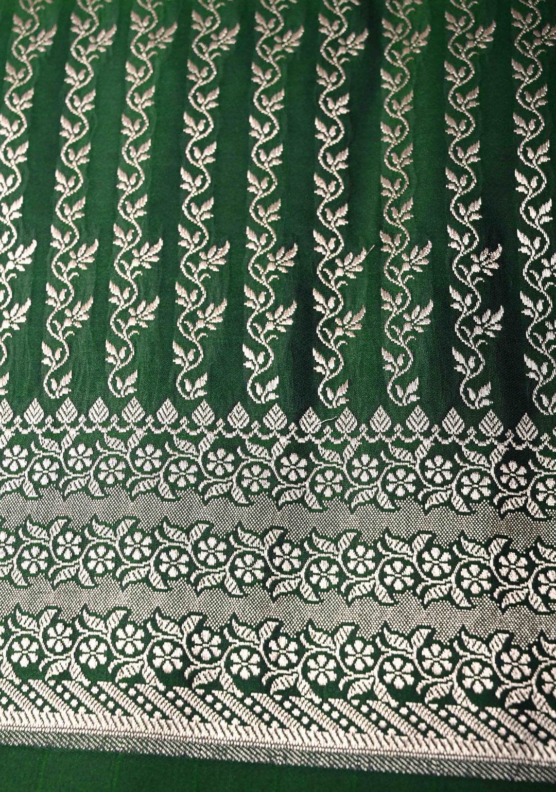 Deep Green Banarasi Semi Mashru Silk Saree with Floral Silver Zari Buttas and Zari Border