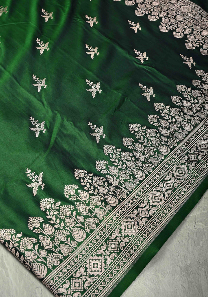 Deep Green Banarasi Semi Mashru Silk Saree with Floral Silver Zari Buttas and Zari Border