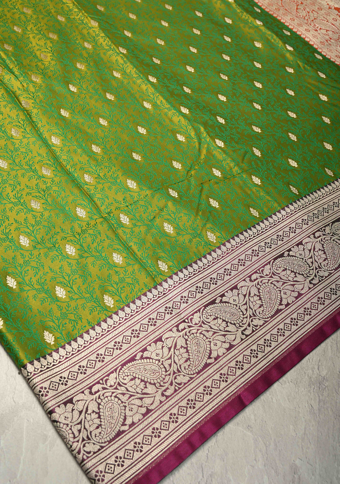 Lime Green Dual Tone Meenakari Jaal on Banarasi Semi Mashru Silk Saree with Floral jaal Silver Zari Buttas and Contrast Zari Border