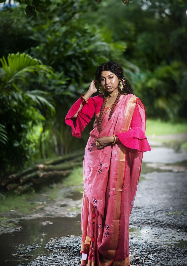 Coral Reddish Pink Linen Saree with Goddess Durga Embroidery | SHOBITAM