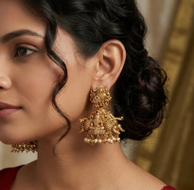 Antique Gold tone Nakshi Peacock Lakshmi Jhumka | SHOBITAM