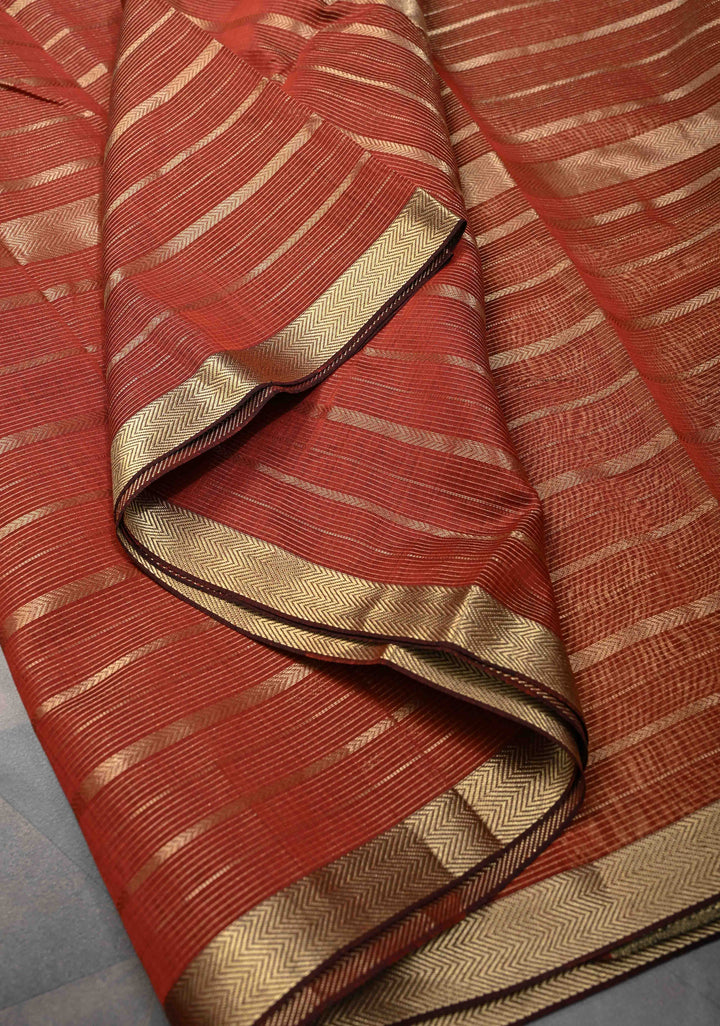 Rust Brown Handwoven Maheshwari Silk Cotton Saree with Horizontal Zari Stripes and Tissue Blouse Piece and Pallu