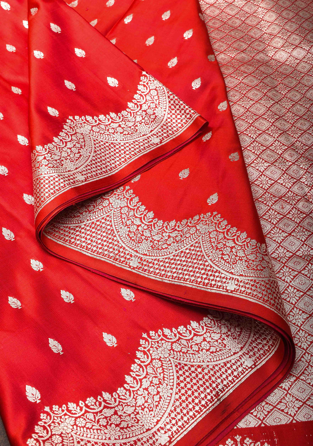 Pinkish Red Mashru silk with Zari butis and Scallop Border | SILK MARK CERTIFIED