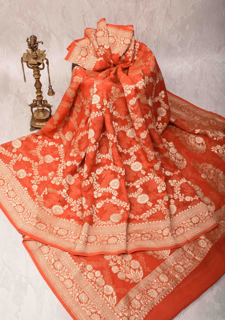 Grapefruit Orange Floral jaal Georgette silk saree with Zari border | SILK MARK CERTIFIED