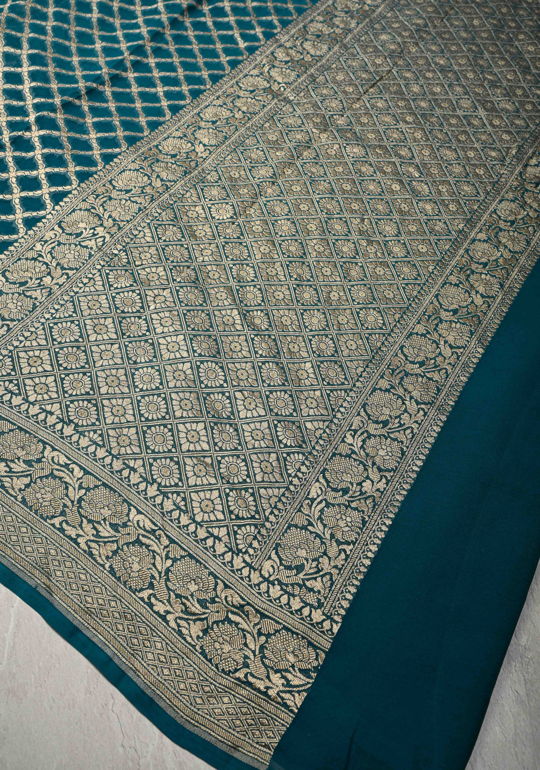 Teal Banarasi Silk Georgette Silk Saree with Geomatric Jaal and Zari Border | SILK MARK CERTIFIED