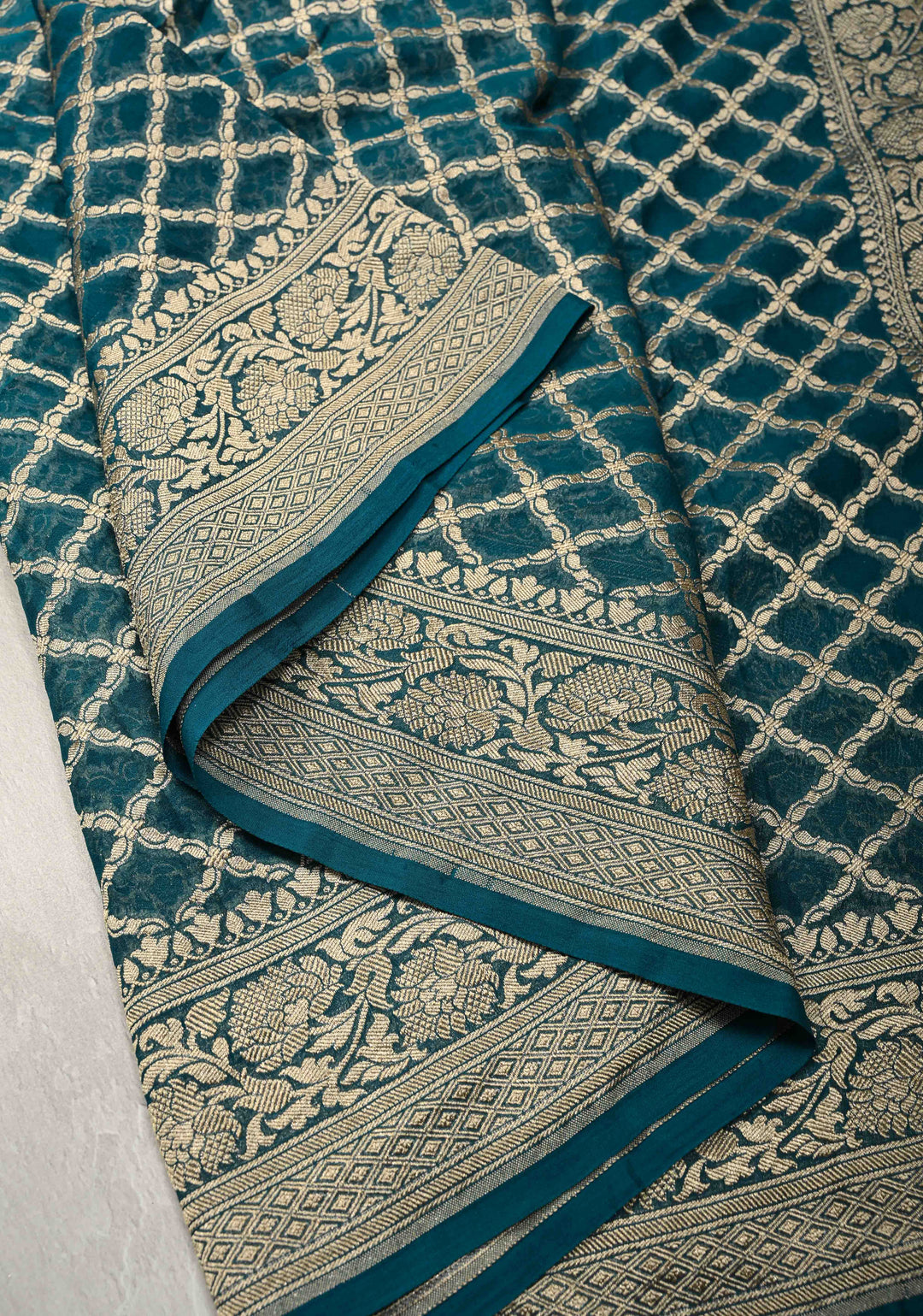 Teal Banarasi Silk Georgette Silk Saree with Geomatric Jaal and Zari Border | SILK MARK CERTIFIED