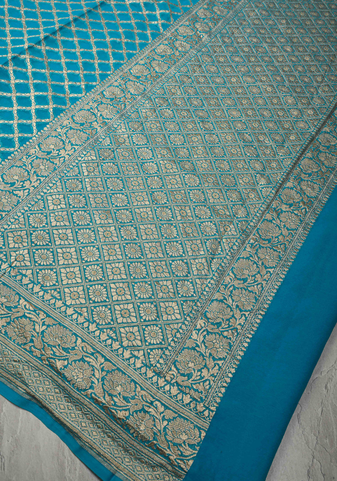 Turquoise Banarasi Georgette Silk Saree with Geomatric Jaal and Zari Border | SILK MARK CERTIFIED