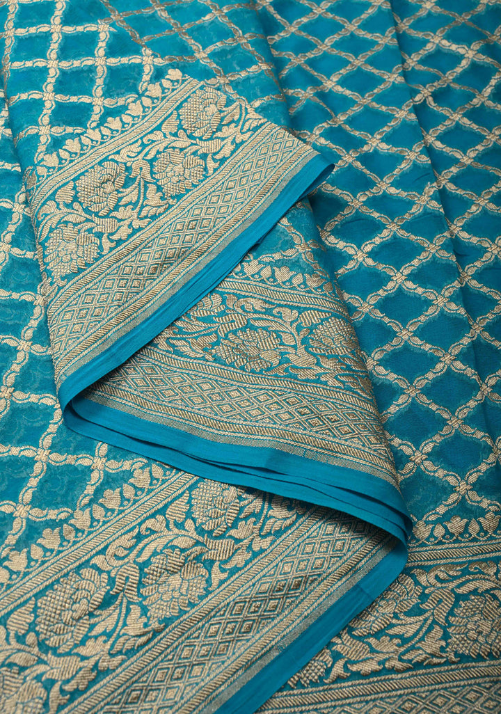 Turquoise Banarasi Georgette Silk Saree with Geomatric Jaal and Zari Border | SILK MARK CERTIFIED