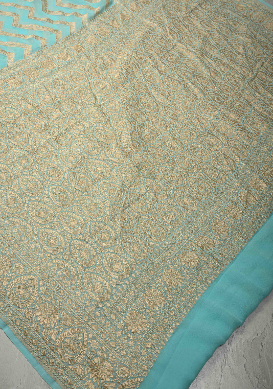 Aqua Blue Banarasi Georgette Silk Saree with Chevron Patterns and Zari Border | SILK MARK CERTIFIED