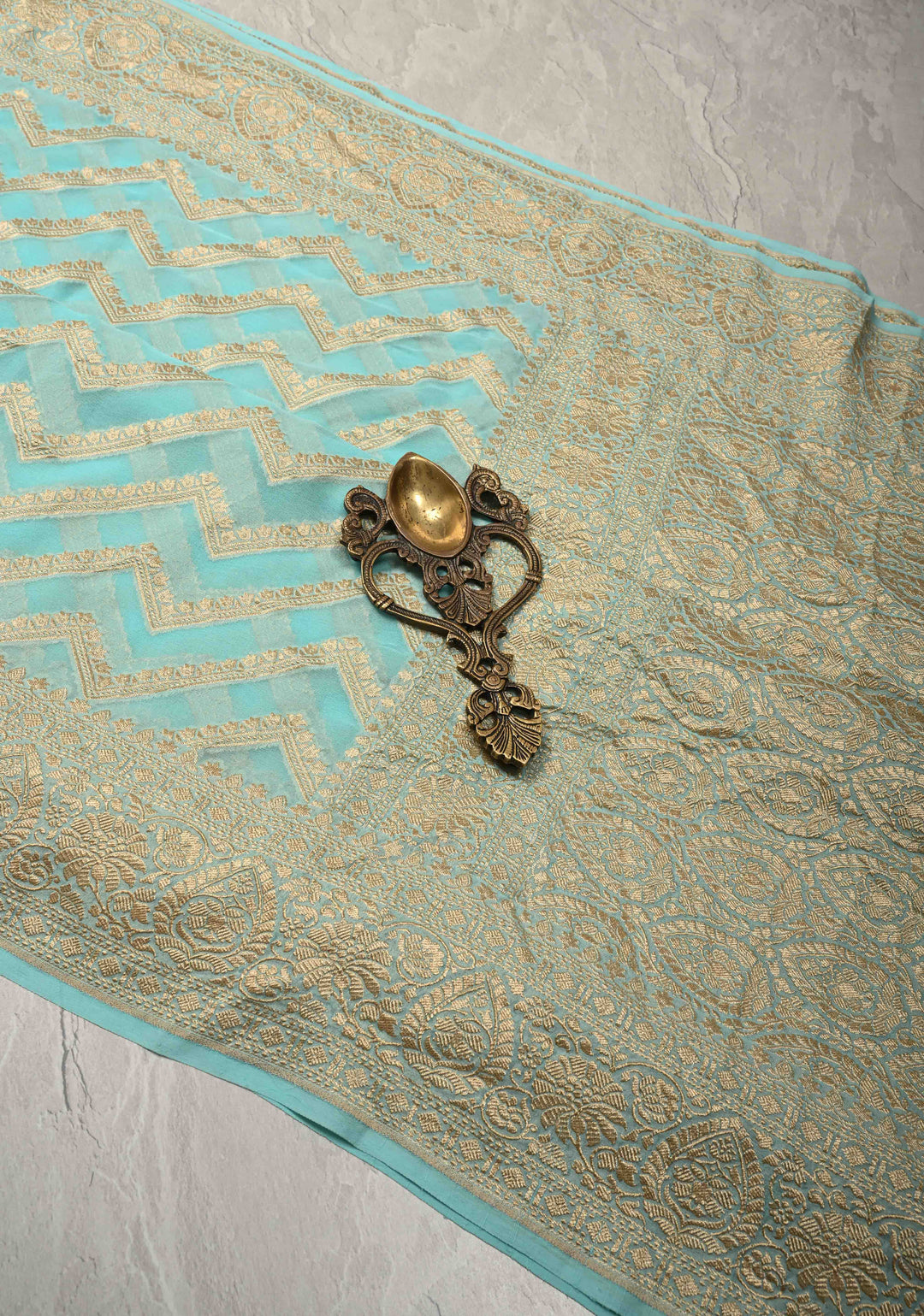 Aqua Blue Banarasi Georgette Silk Saree with Chevron Patterns and Zari Border | SILK MARK CERTIFIED