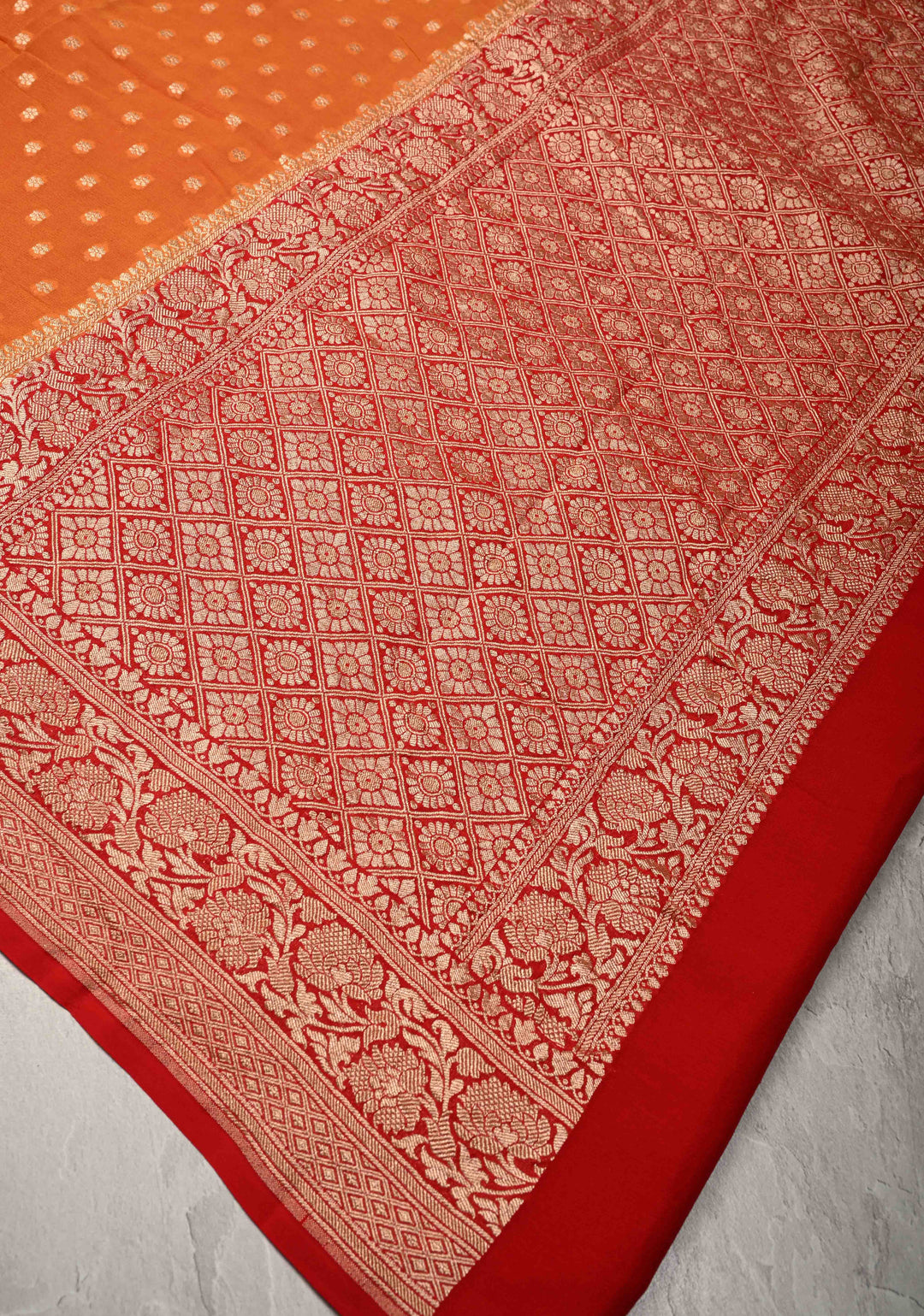 Orange Banarasi Georgette Silk Saree with Floral Butta and Contrast Zari Border | SILK MARK CERTIFIED