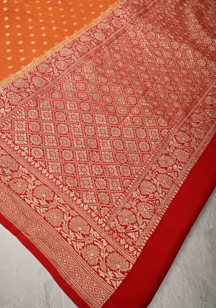Orange Banarasi Georgette Silk Saree with Floral Butta and Contrast Zari Border | SILK MARK CERTIFIED
