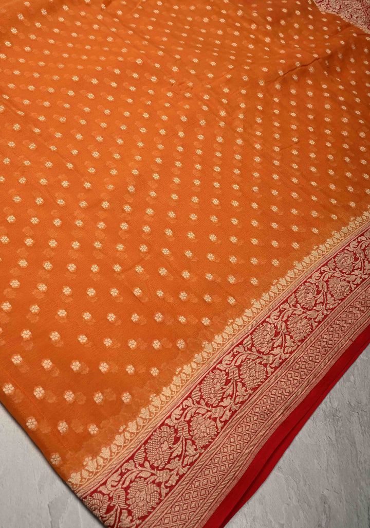 Orange Banarasi Georgette Silk Saree with Floral Butta and Contrast Zari Border | SILK MARK CERTIFIED