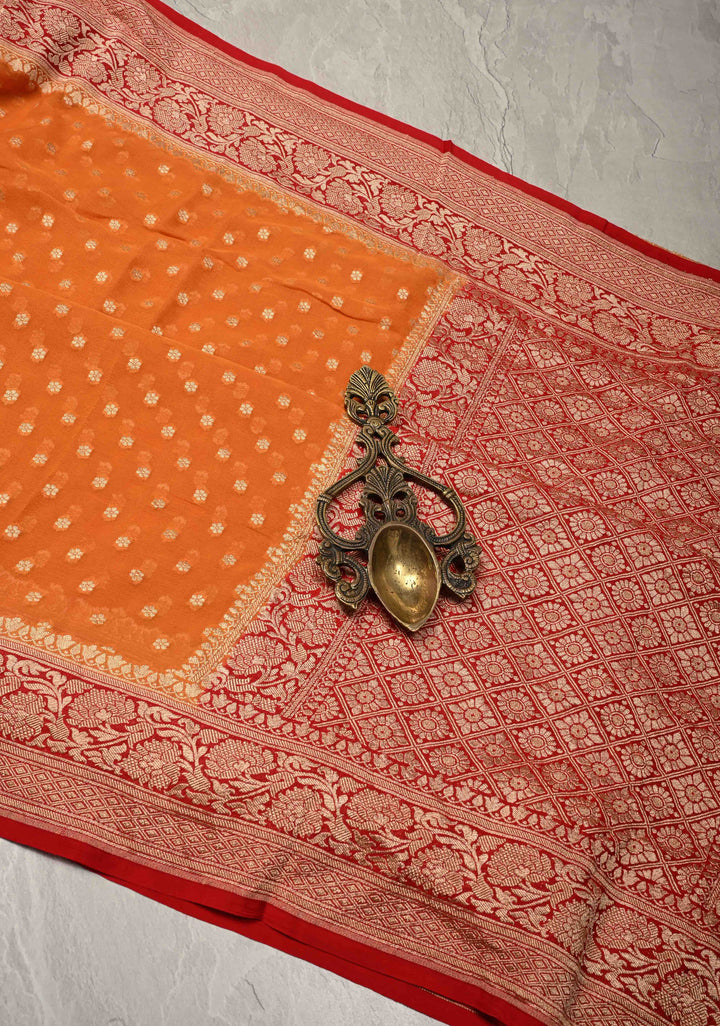 Orange Banarasi Georgette Silk Saree with Floral Butta and Contrast Zari Border | SILK MARK CERTIFIED