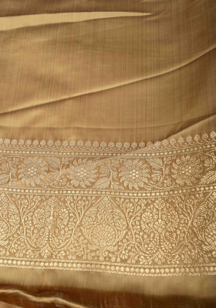 Chiku Banarasi Semi Mashru Silk Saree with Floral Zari Buttas and Bright Gold Zari detailing | SHOBITAM