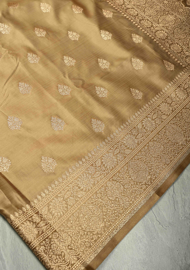 Chiku Banarasi Semi Mashru Silk Saree with Floral Zari Buttas and Bright Gold Zari detailing | SHOBITAM