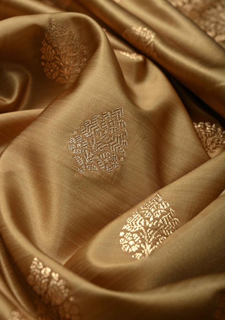 Chiku Banarasi Semi Mashru Silk Saree with Floral Zari Buttas and Bright Gold Zari detailing | SHOBITAM