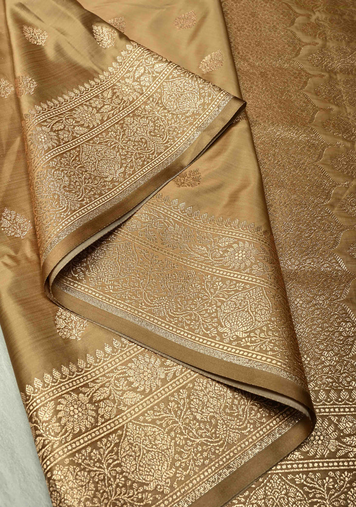 Chiku Banarasi Semi Mashru Silk Saree with Floral Zari Buttas and Bright Gold Zari detailing | SHOBITAM