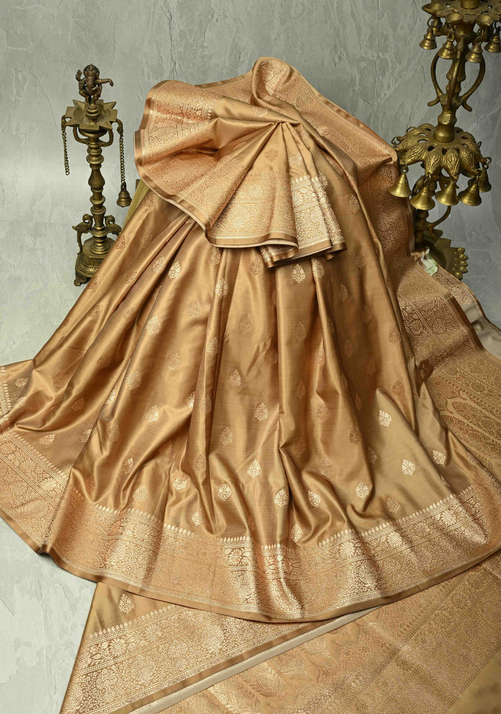 Chiku Banarasi Semi Mashru Silk Saree with Floral Zari Buttas and Bright Gold Zari detailing | SHOBITAM