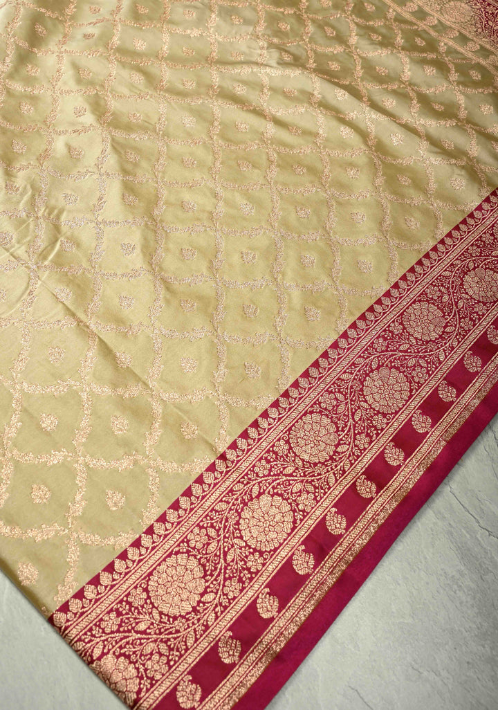 Off White Banarasi Semi Mashru Silk Saree with jaal Design and Bright Gold Zari detailing