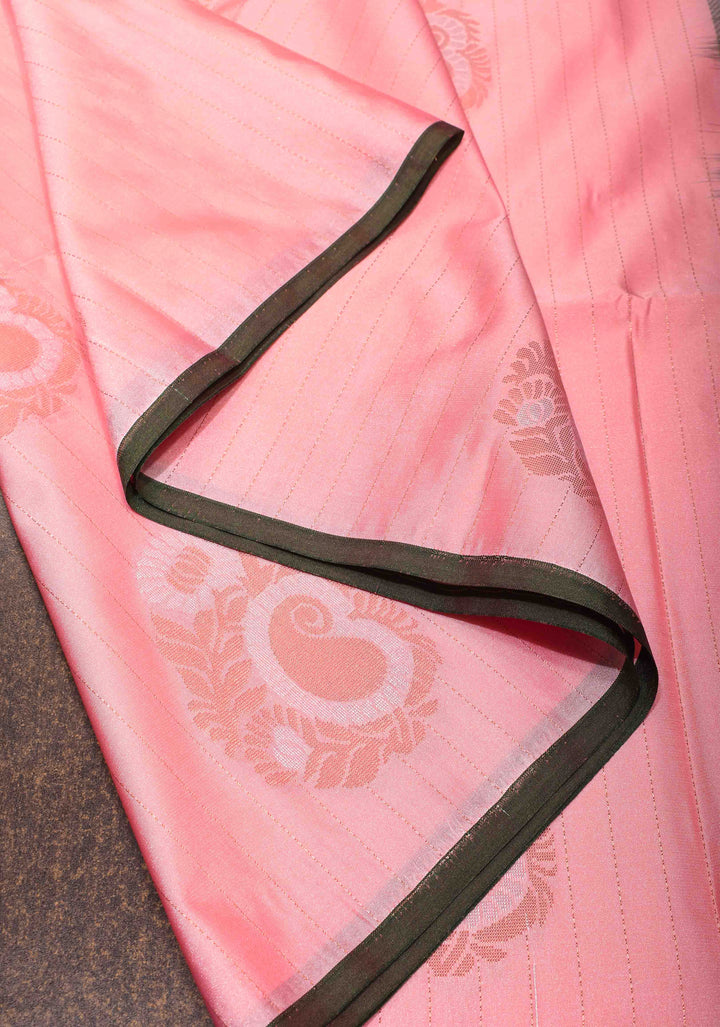 Graceful Peachy-Pink Semi  Silk Saree with Intricate Golden Motifs and Contrast Green Border