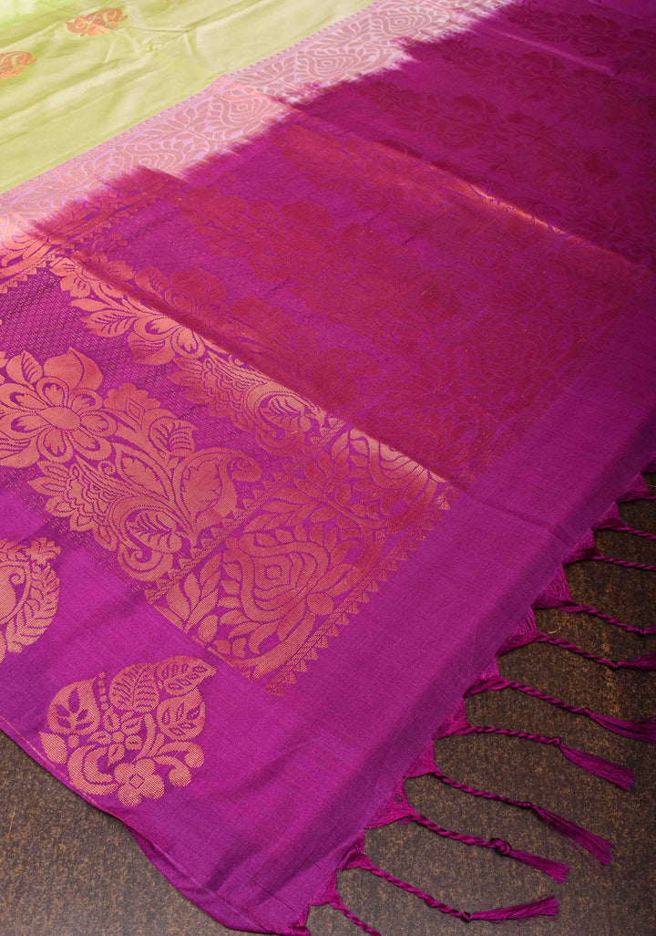 Tea Green Semi Silk Saree with Zari Buttas and Distinct Zari Motifs on Border