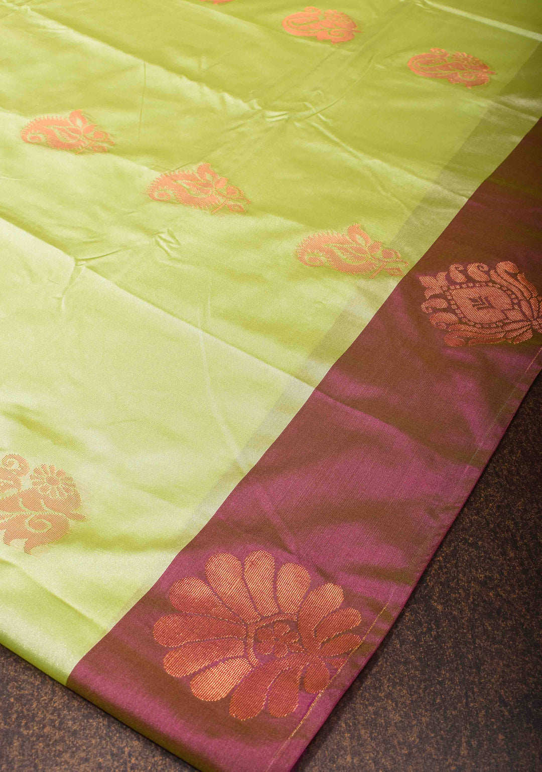 Tea Green Semi Silk Saree with Zari Buttas and Distinct Zari Motifs on Border