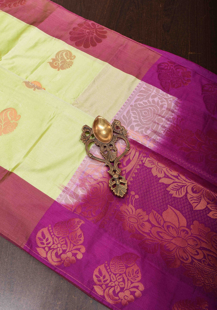 Tea Green Semi Silk Saree with Zari Buttas and Distinct Zari Motifs on Border
