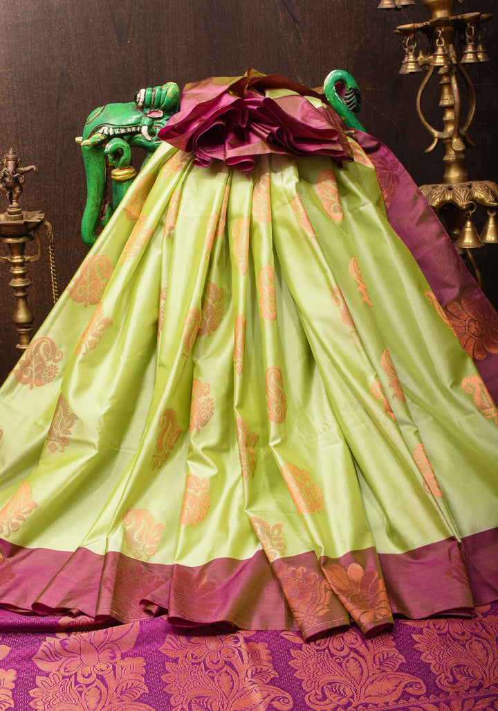 Tea Green Semi Silk Saree with Zari Buttas and Distinct Zari Motifs on Border