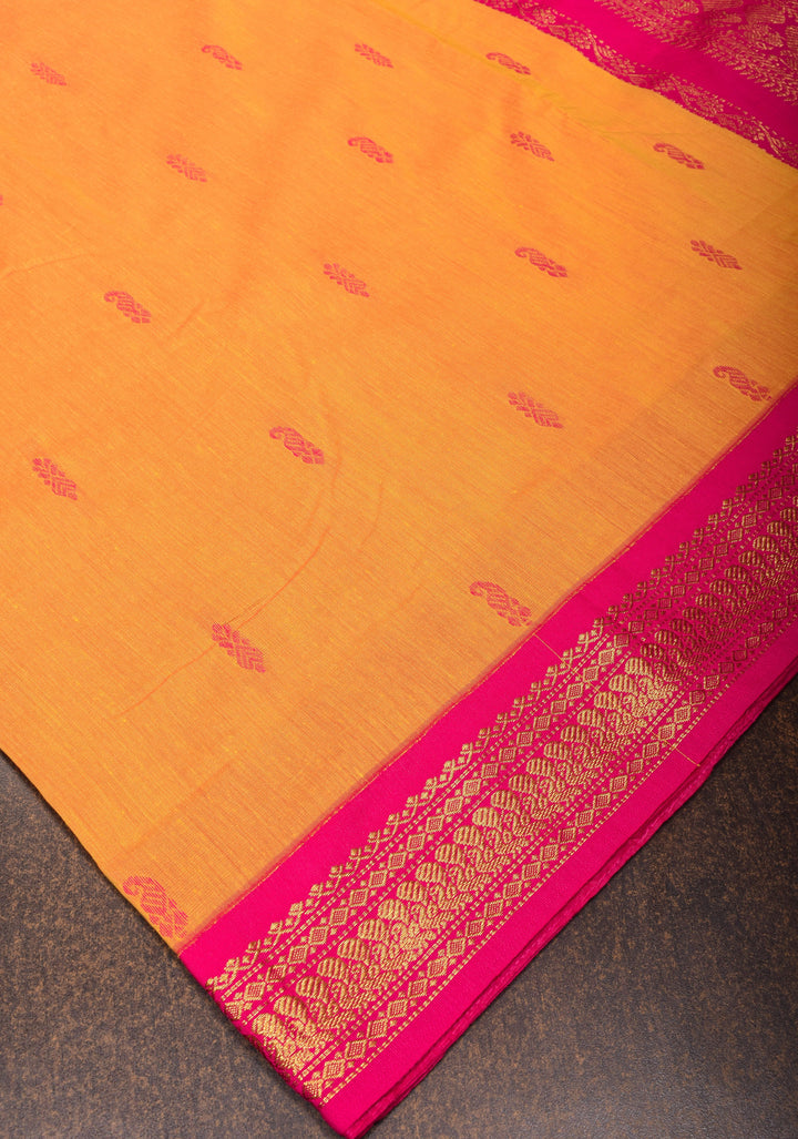Cotton silk saree in yellow with Pink contrast Border