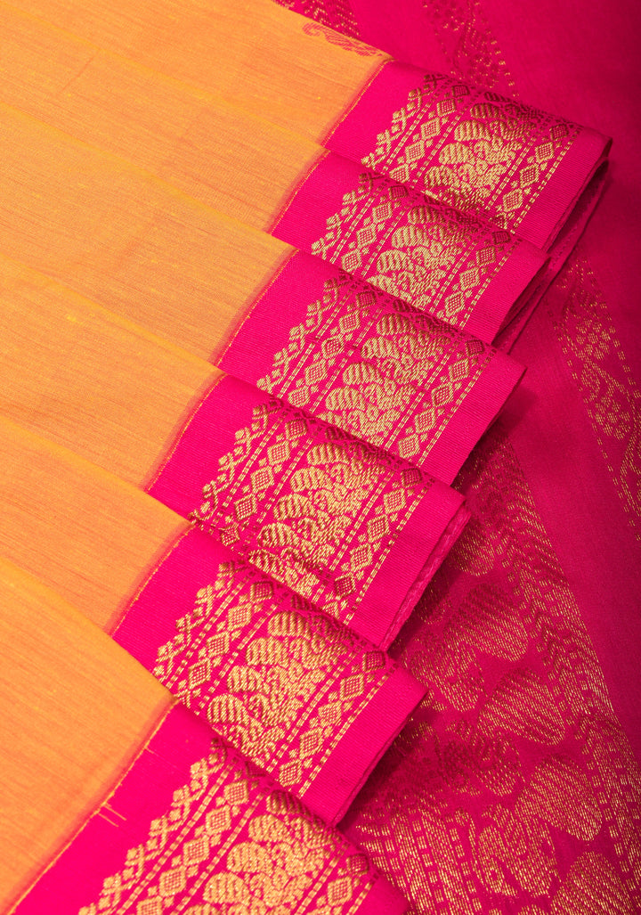 Cotton silk saree in yellow with Pink contrast Border