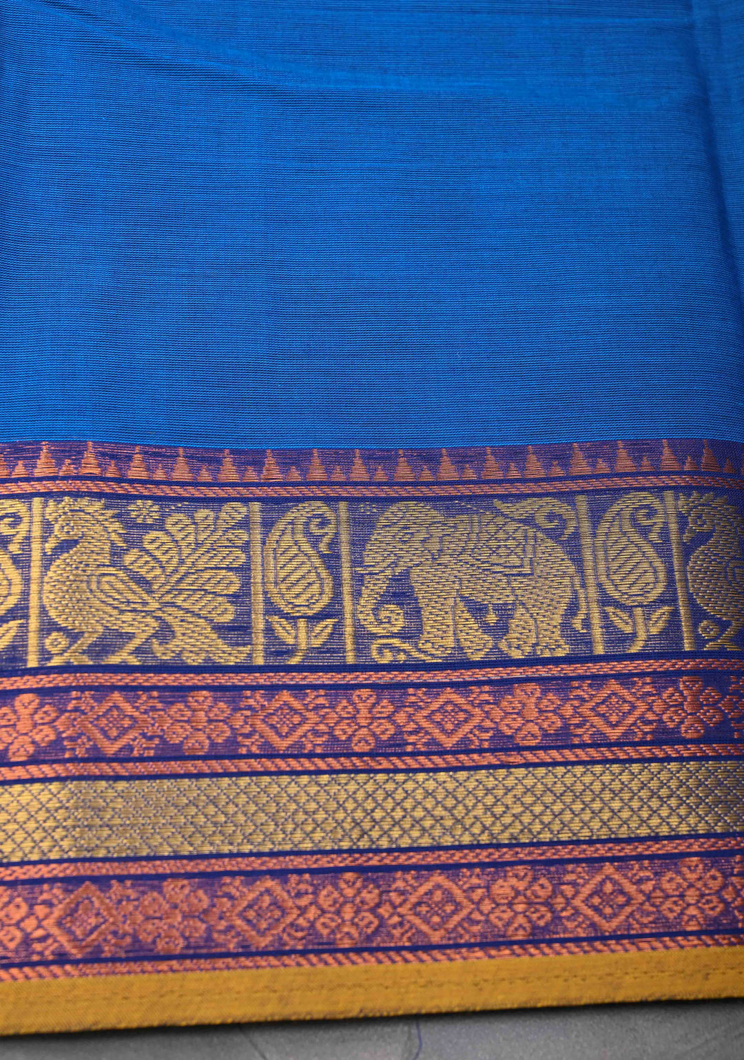 Egyptian Blue Kanchi Cotton Saree with Zari Buttas And Contrast Zari Border