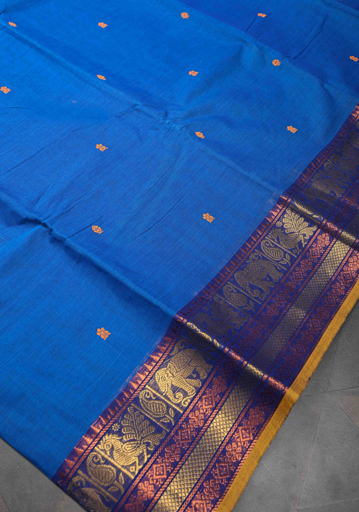Egyptian Blue Kanchi Cotton Saree with Zari Buttas And Contrast Zari Border