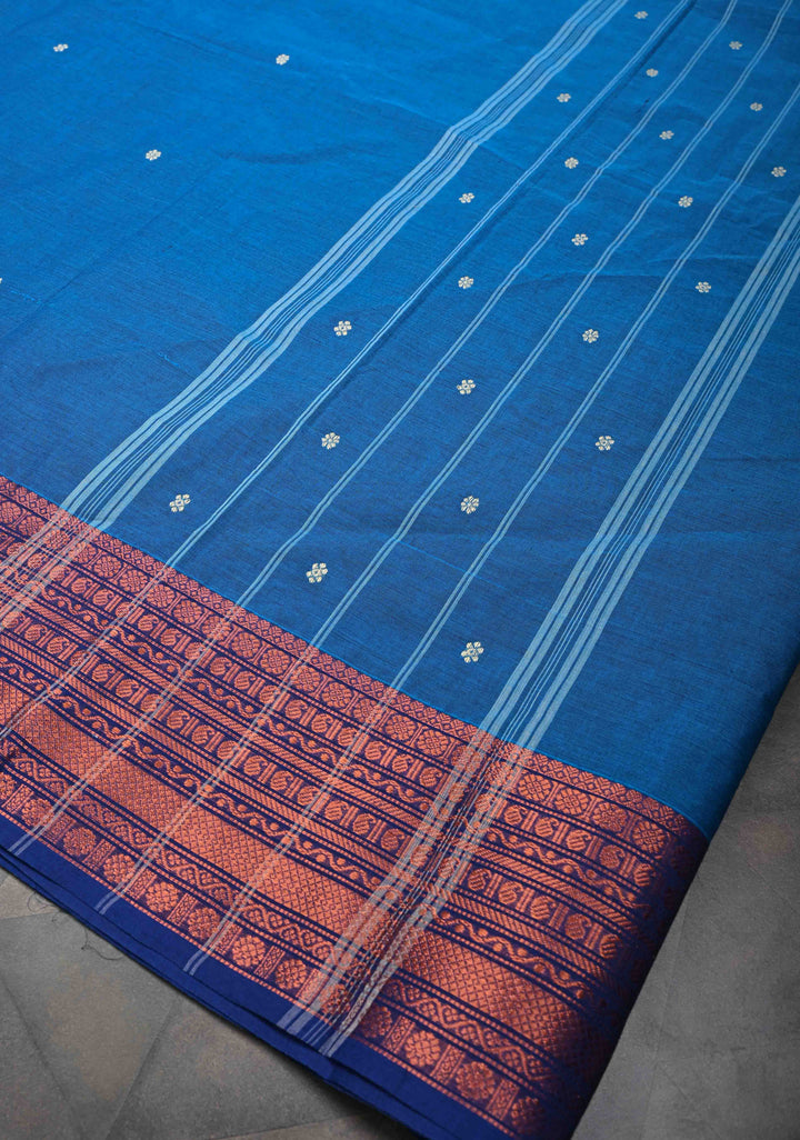 Sapphire Blue Kanchi Cotton Saree with Floral Buttas And Contrast Zari Border