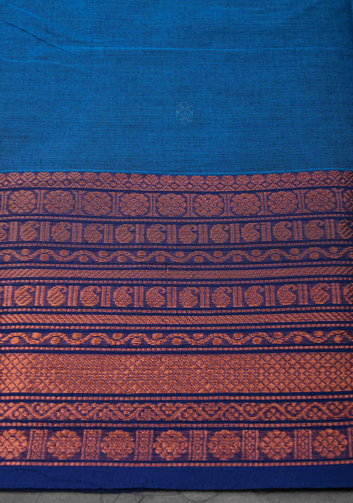 Sapphire Blue Kanchi Cotton Saree with Floral Buttas And Contrast Zari Border