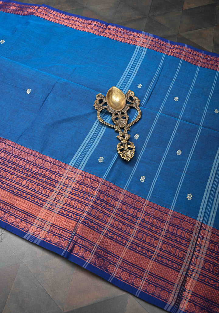 Sapphire Blue Kanchi Cotton Saree with Floral Buttas And Contrast Zari Border