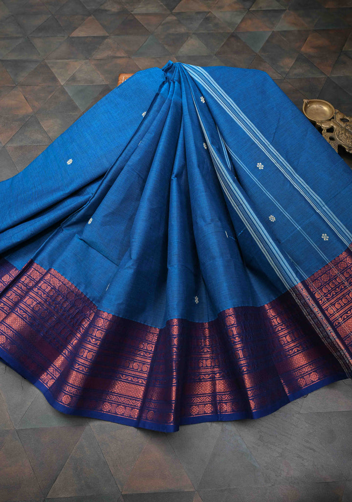 Sapphire Blue Kanchi Cotton Saree with Floral Buttas And Contrast Zari Border